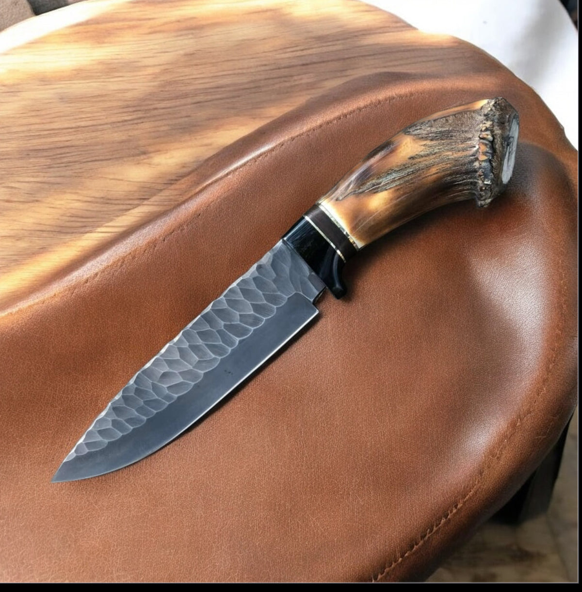 Full-size J2 steel Bowie knife with buffalo horn and stag handle and leather sheath