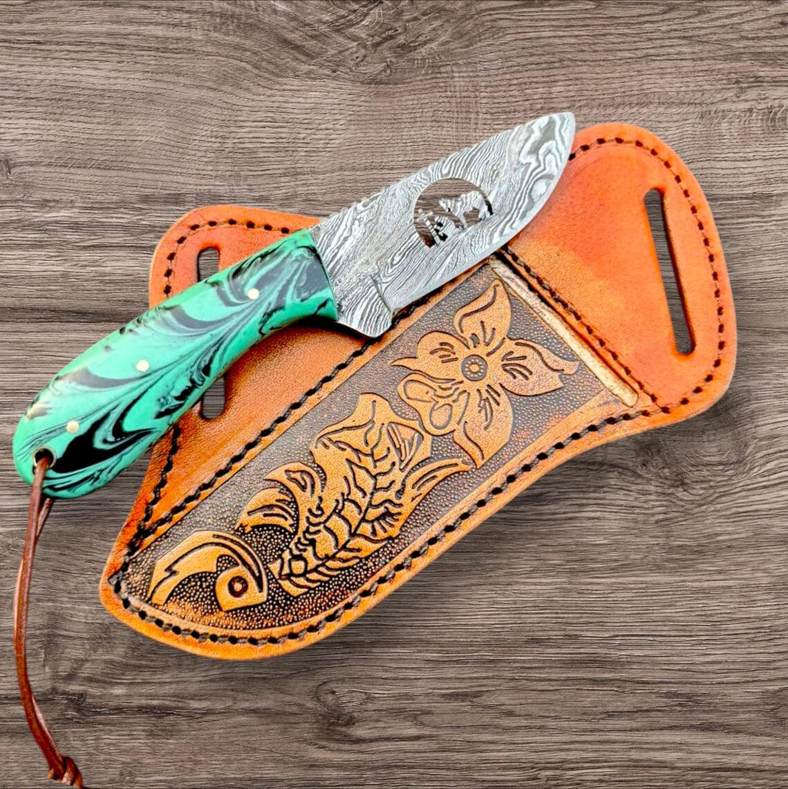 Damascus bull cutter knife with a wire-cut blade pattern and resin handle