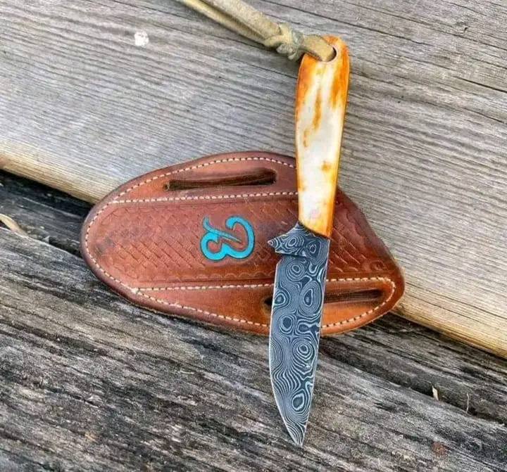 Damascus belt knife with camel bone handle and leather belt loop sheath