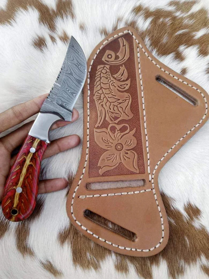 Damascus cowboy knife with pine cone handle and leather sheath