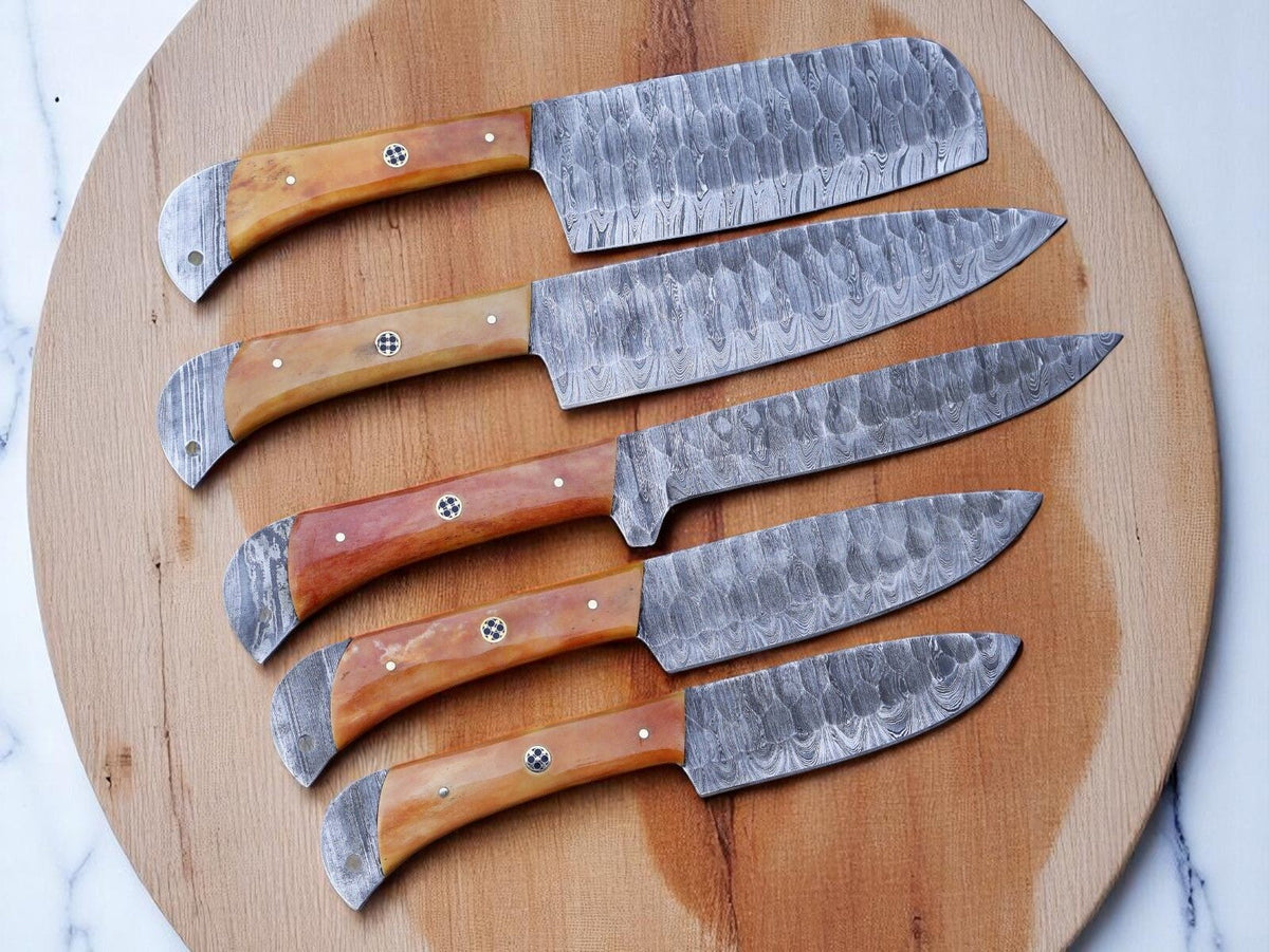 Five-piece Damascus knife set with colored bone handles