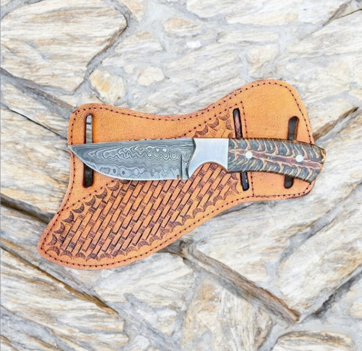 Rasp steel ranch knife with pine cone handle, steel bolster, and leather belt sheath