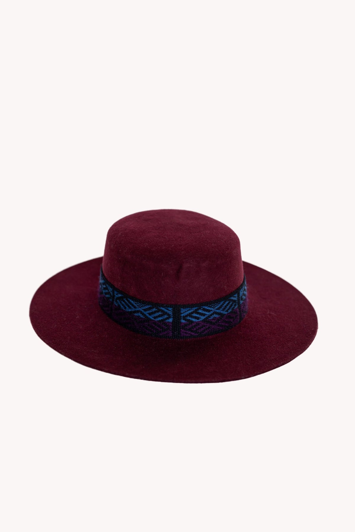 Maroon alpaca wool felt Spanish style hat with a woven textile band, view 4