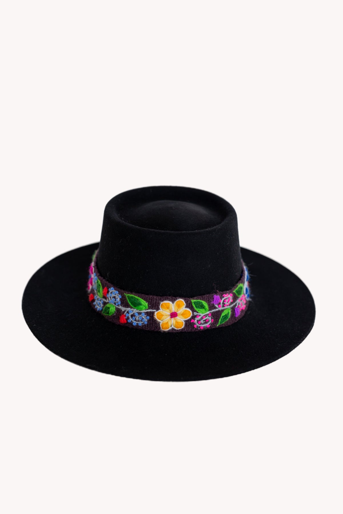 Black alpaca wool felt bucket hat with a woven textile band, view 4