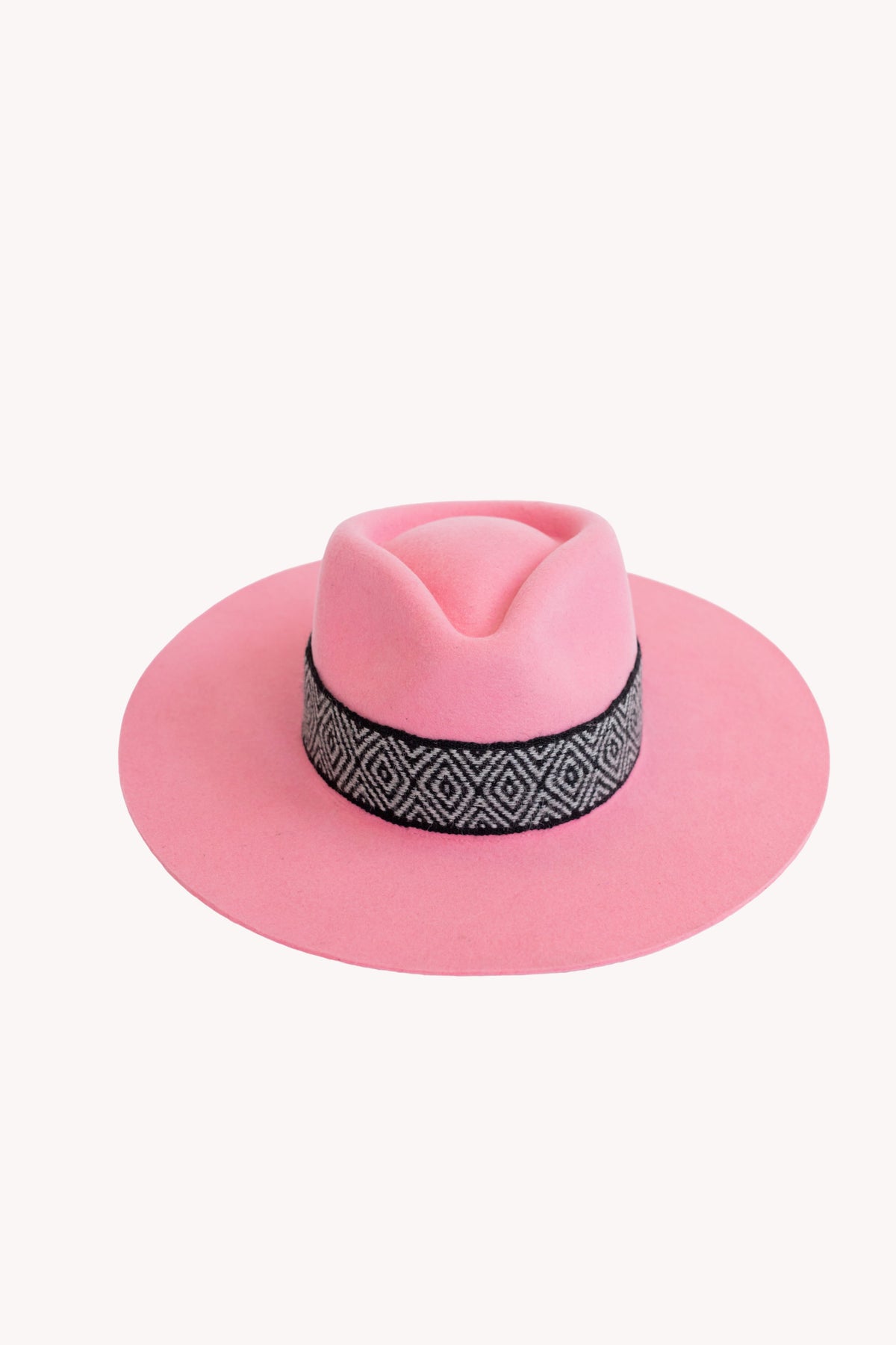 Bubble gum pink alpaca wool felt Western hat with a woven hat band