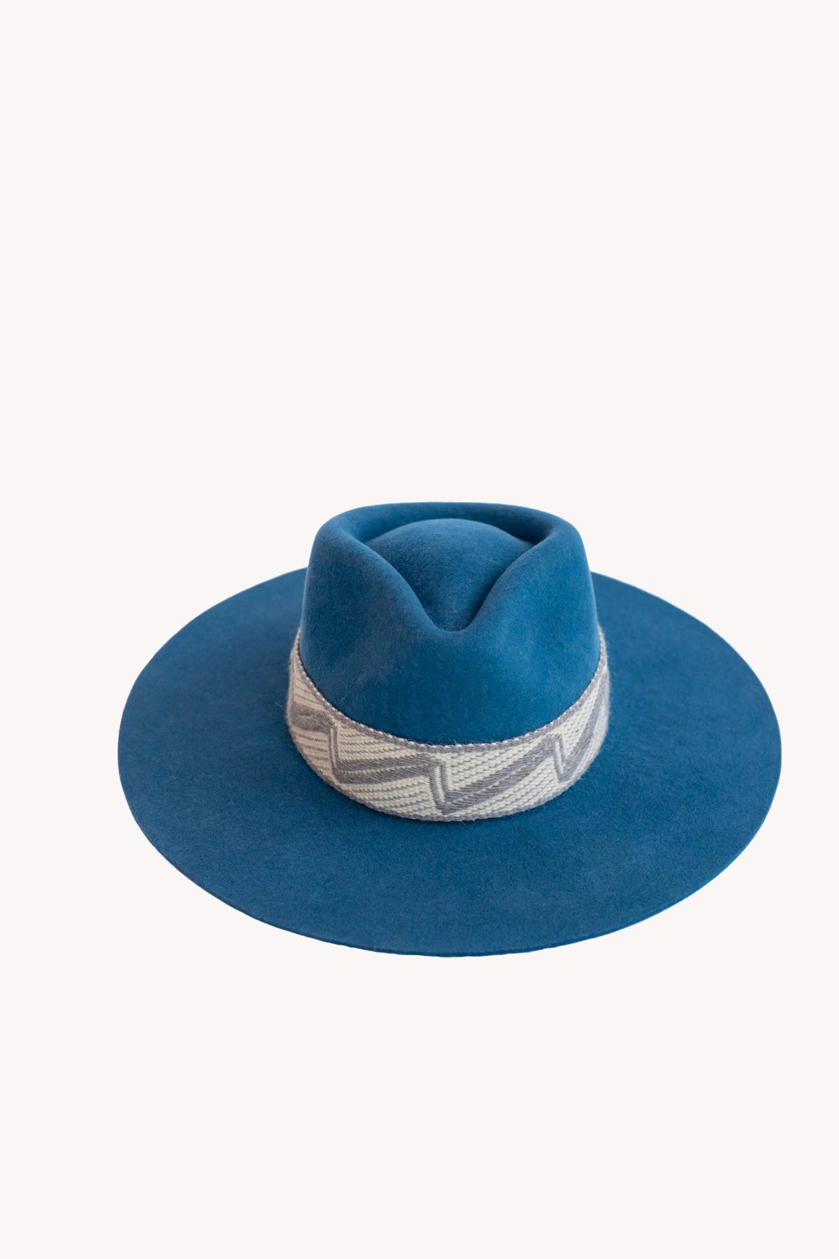 Denim blue alpaca wool felt Western hat with a woven hatband