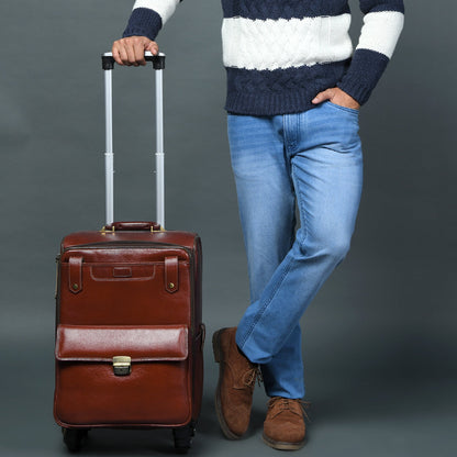 Cherry red-brown leather carry-on trolley bag with four wheels and handle, view 3