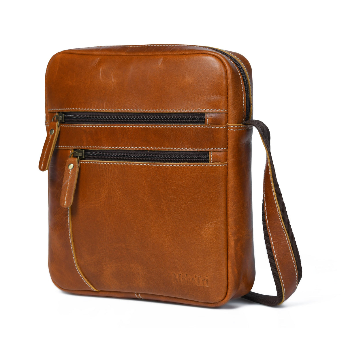 Tan buffalo leather compact messenger bag with front zip pockets