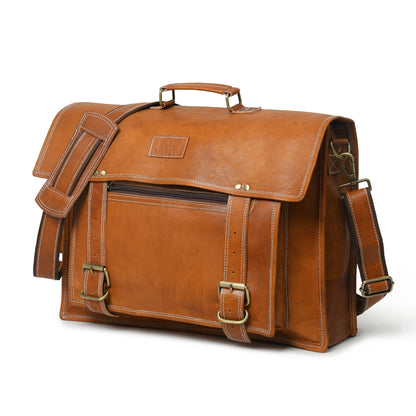 Tan brown leather messenger bag with brass buckles and large front pocket