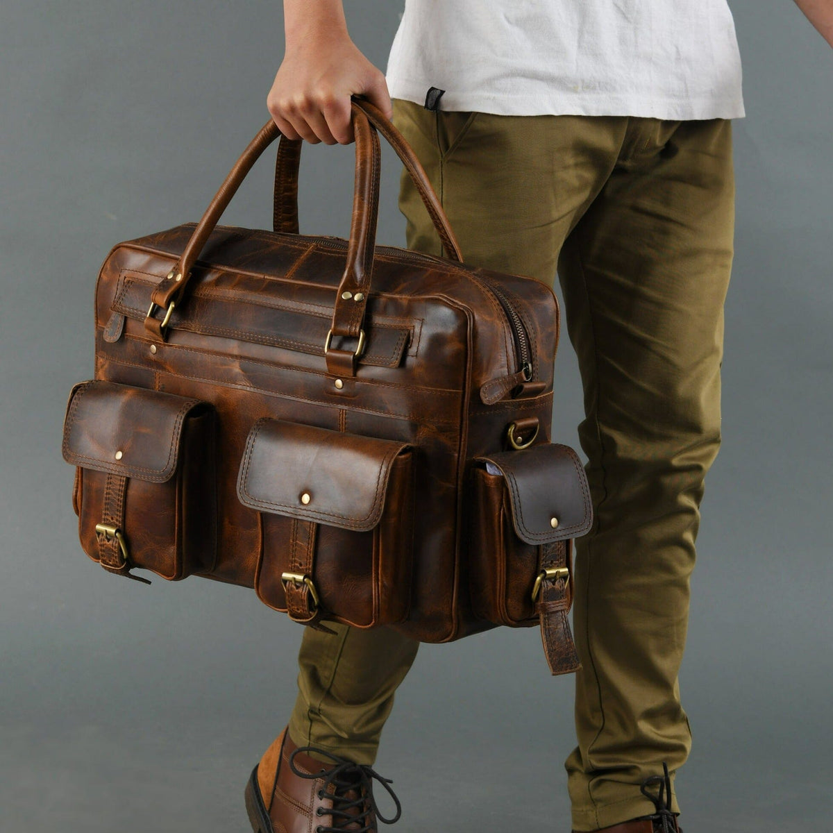 Brown buffalo leather laptop briefcase with brass hardware and shoulder strap, view 2