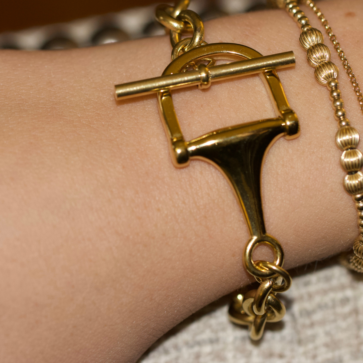Gold horse bit toggle bracelet, view 4