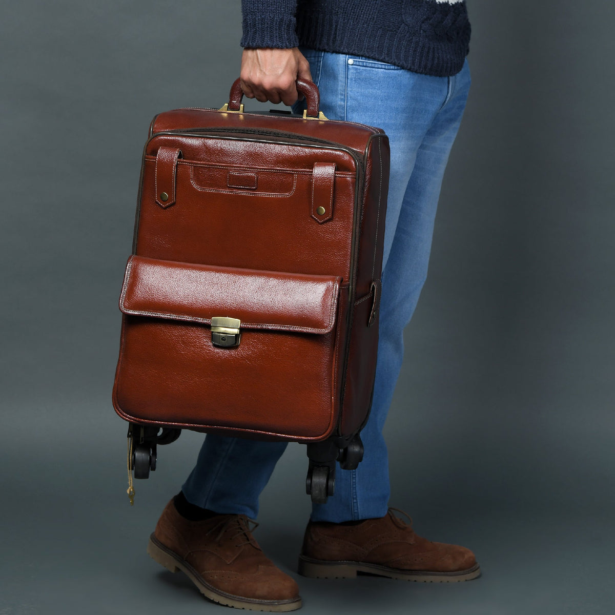 Cherry red-brown leather carry-on trolley bag with four wheels and handle, view 4
