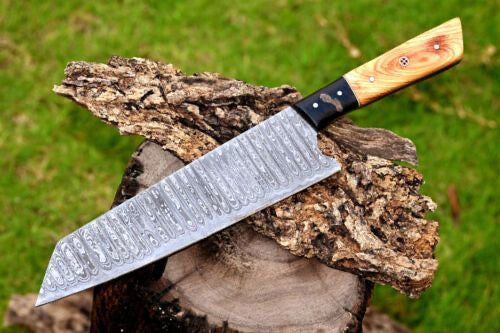 Damascus steel chef knife with twist pattern blade and wooden handle