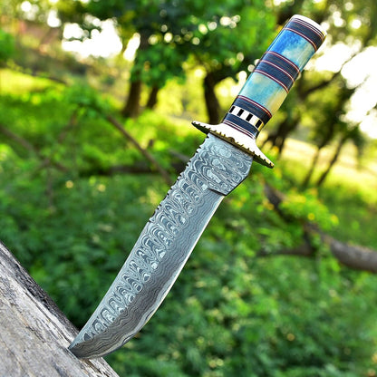 Damascus Bowie knife with a color bone and pakkawood handle and brass guard