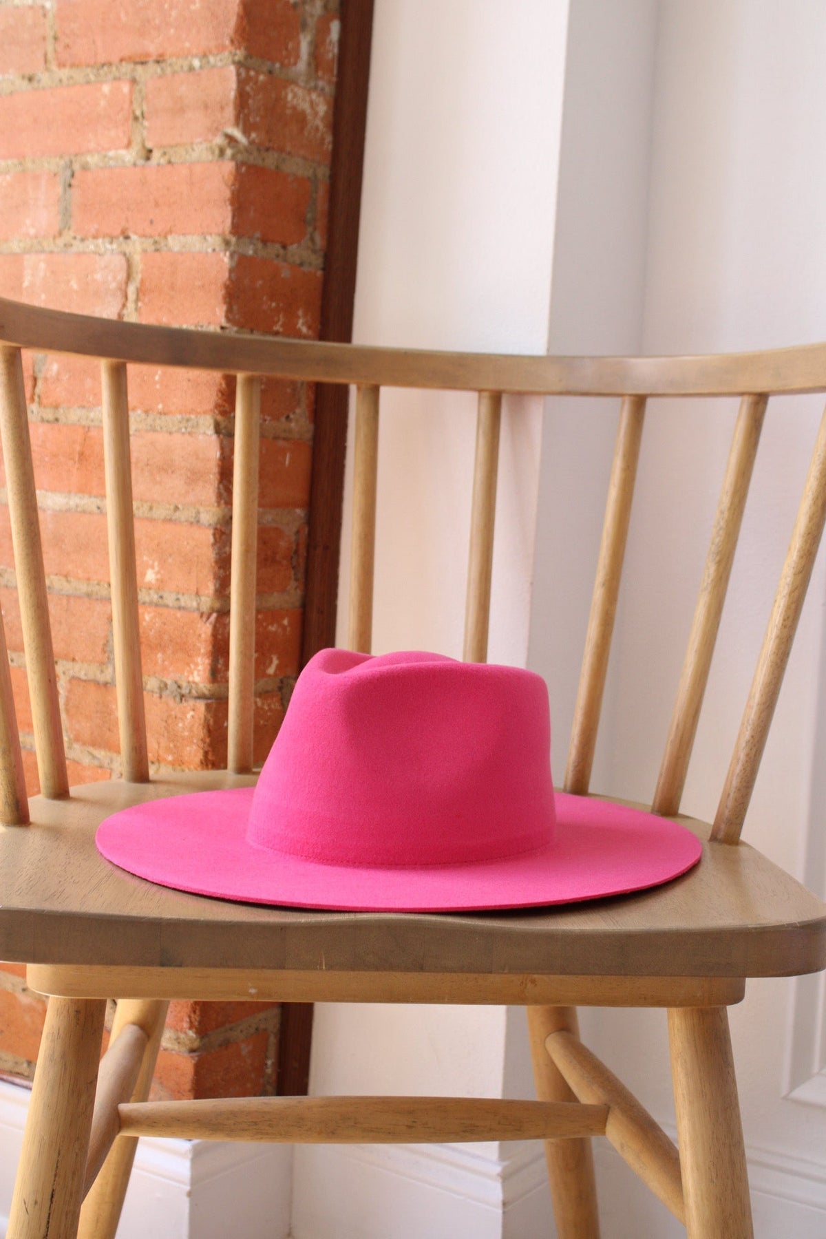 Pink merino wool felt rancher hat with a lifted brim