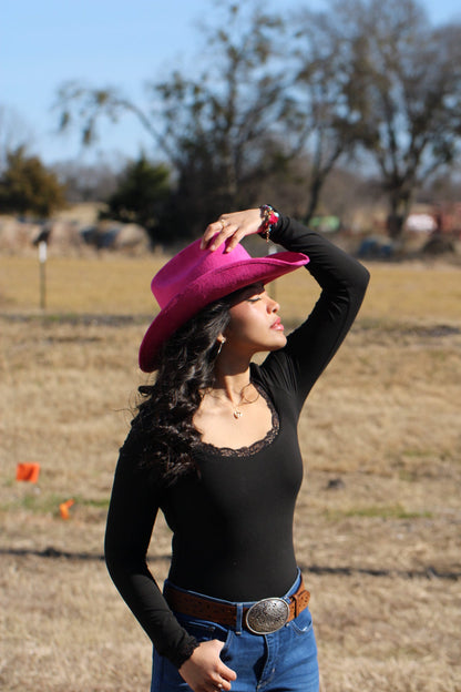 Magenta vegan suede cowboy hat with a lifted brim and faux leather band, view 2