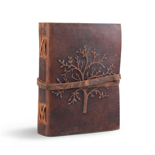 Dark brown leather journal with embossed tree and wrap strap