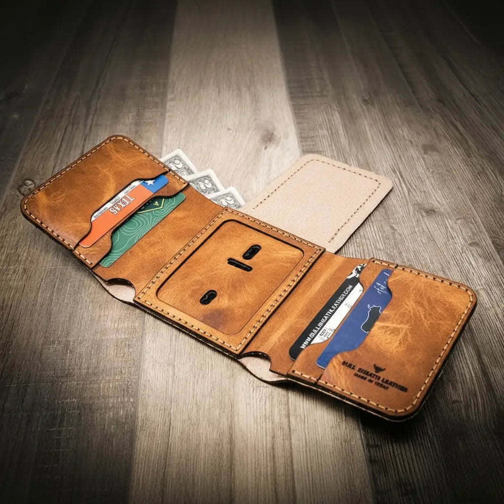 Saddle tan leather trifold badge wallet open to show badge slot and ID window