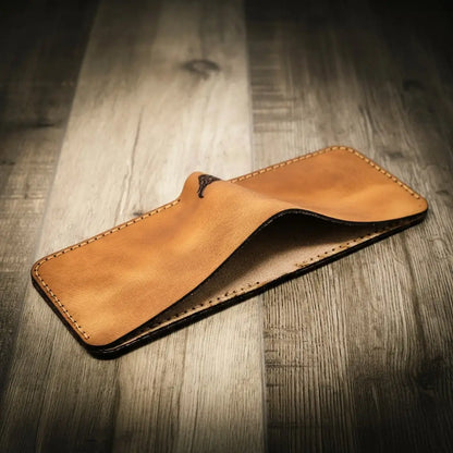 Saddle tan leather bifold wallet with burnished edges, view 2