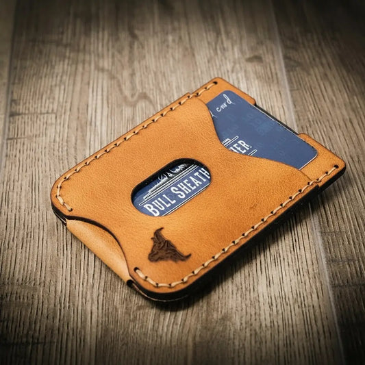 Saddle tan leather money clip wallet with card slots and metal clip