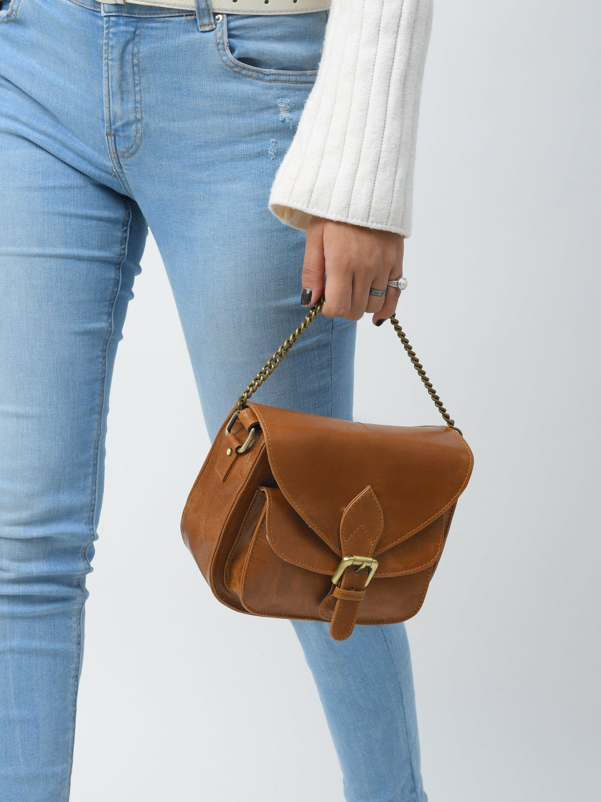 Tan brown leather crossbody satchel with buckle flap closure, view 3