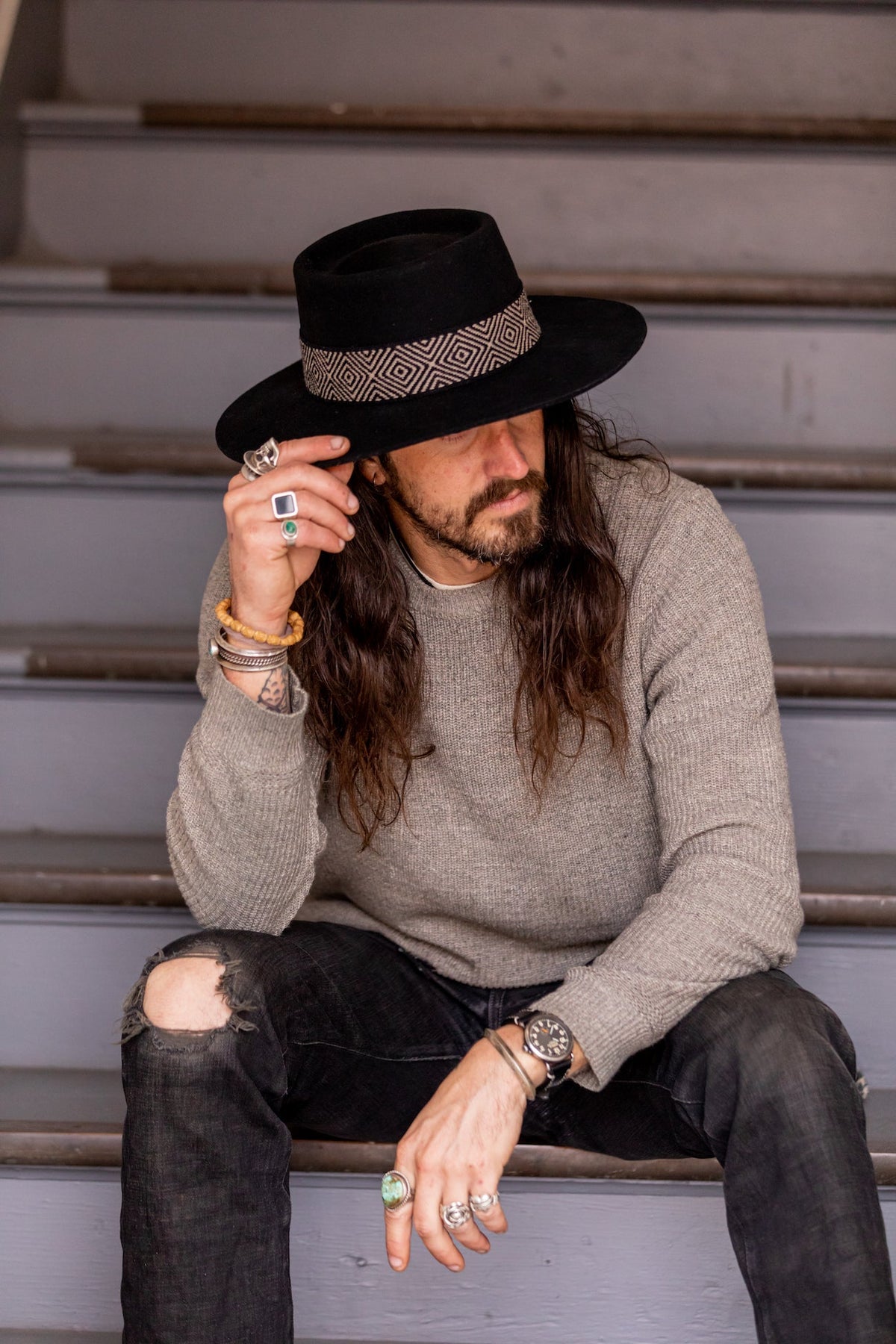 Black alpaca wool felt bucket hat with a woven textile band, view 2