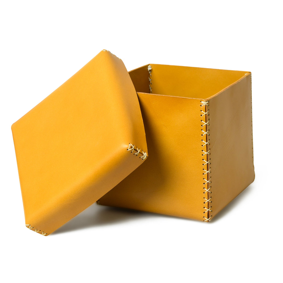 Set of three square leather storage boxes in graduated sizes