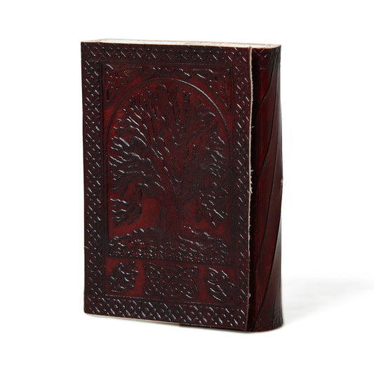 Leather journal with embossed tree motif and leather string closure