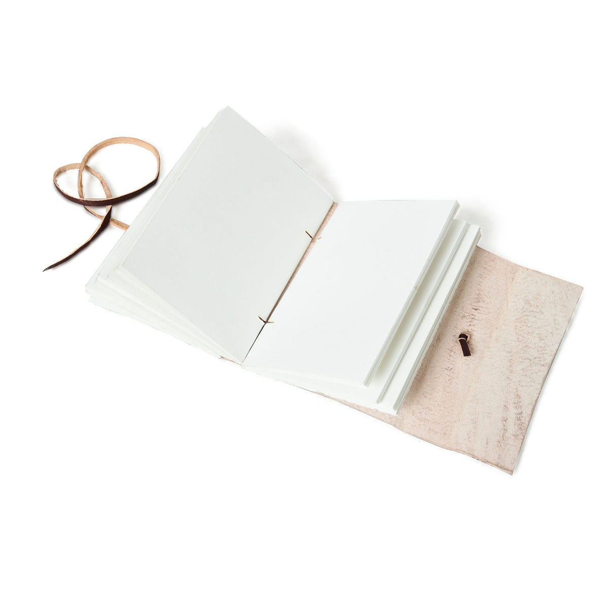Leather journal with embossed tree motif and leather string closure, view 3