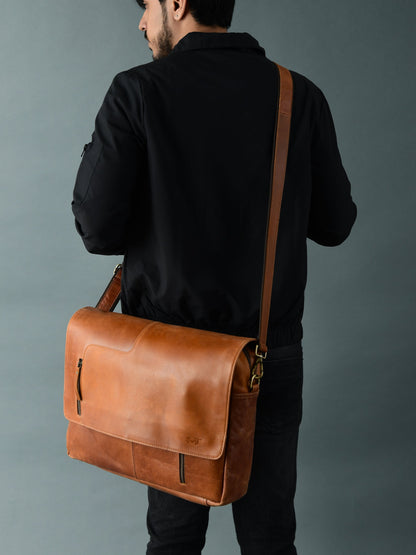 Tan buffalo leather crossbody bag with brass clasp flap, view 3