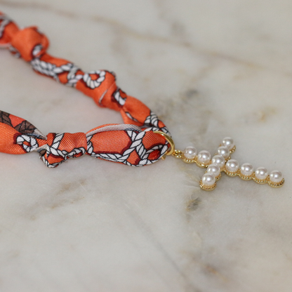 Orange scarf necklace with gold framed pearl cross, view 2