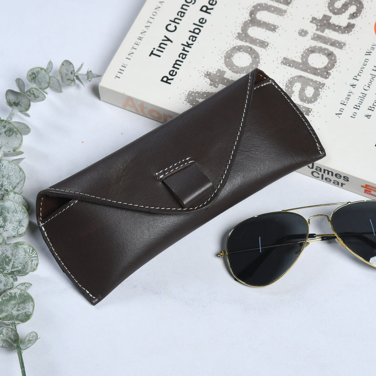 Brown leather sunglasses case with magnetic closure, view 2