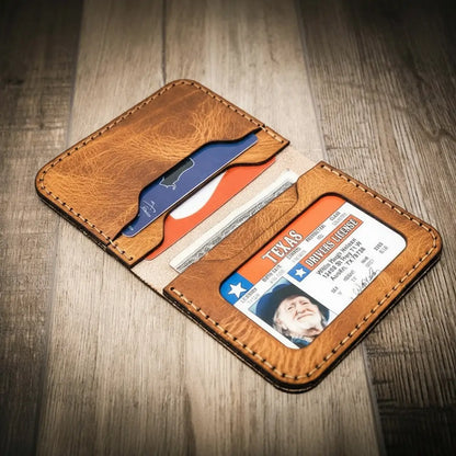 Saddle tan slim leather wallet with brown contrast stitching