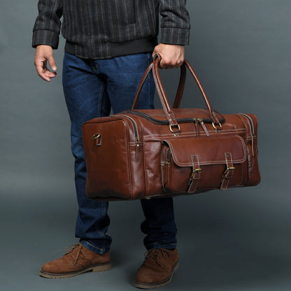 Vintage brown buffalo leather duffle bag with brass buckles and exterior pockets, view 2