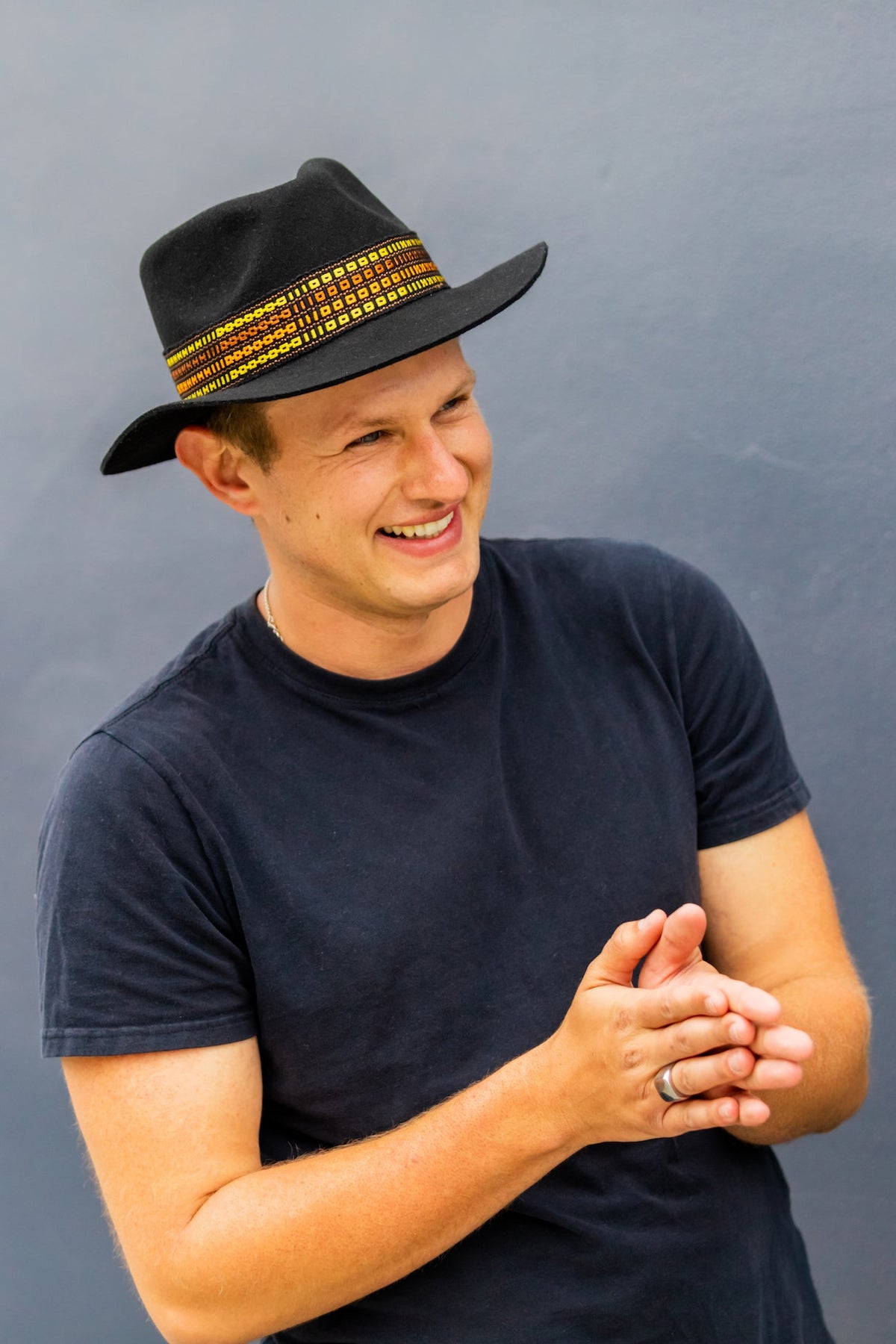 Black alpaca wool felt fedora with a short brim and woven band, view 3