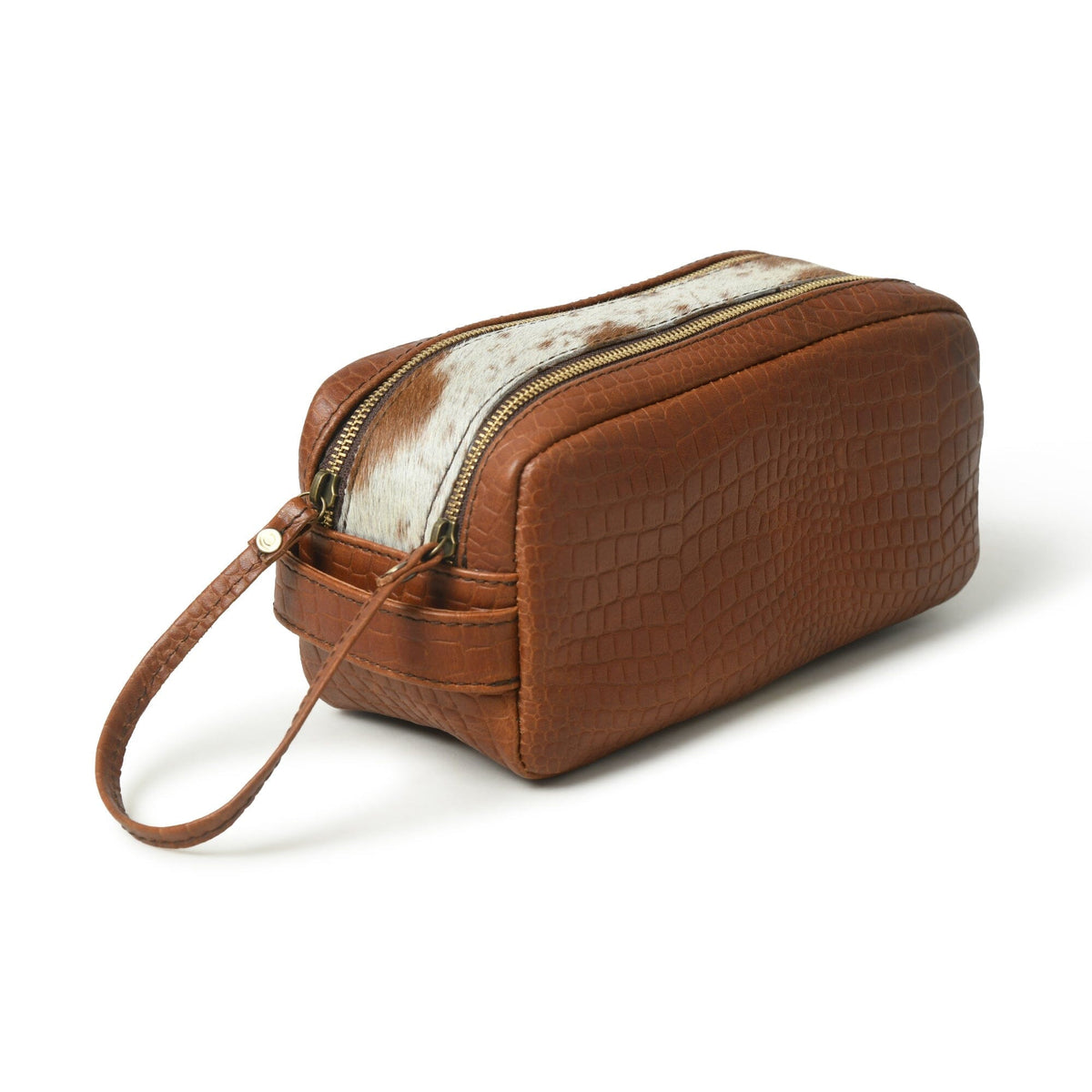 Brown leather toiletry bag with hair-on hide and zip top