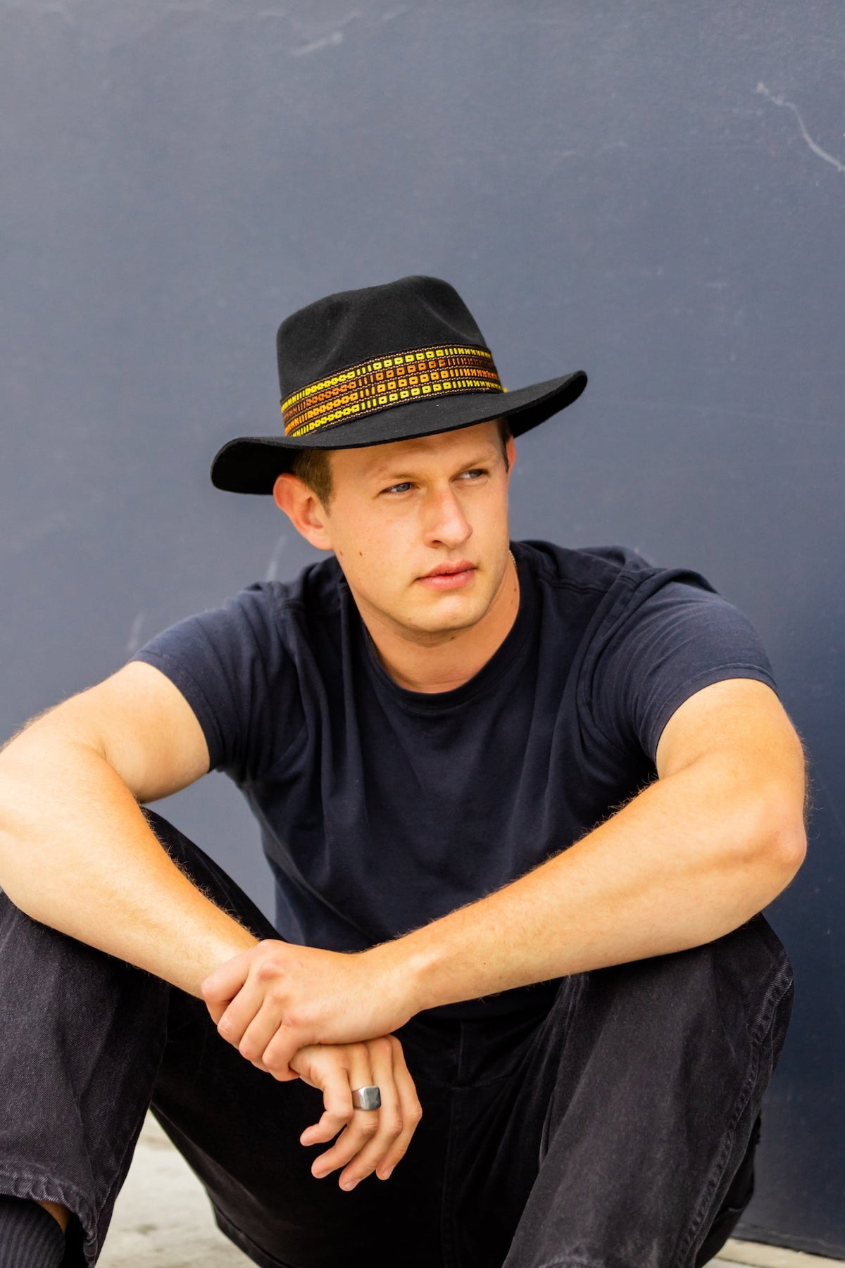 Black alpaca wool felt fedora with a short brim and woven band, view 4