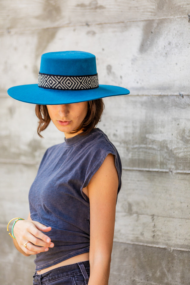 Denim blue alpaca wool felt Spanish style hat with a woven band, view 2