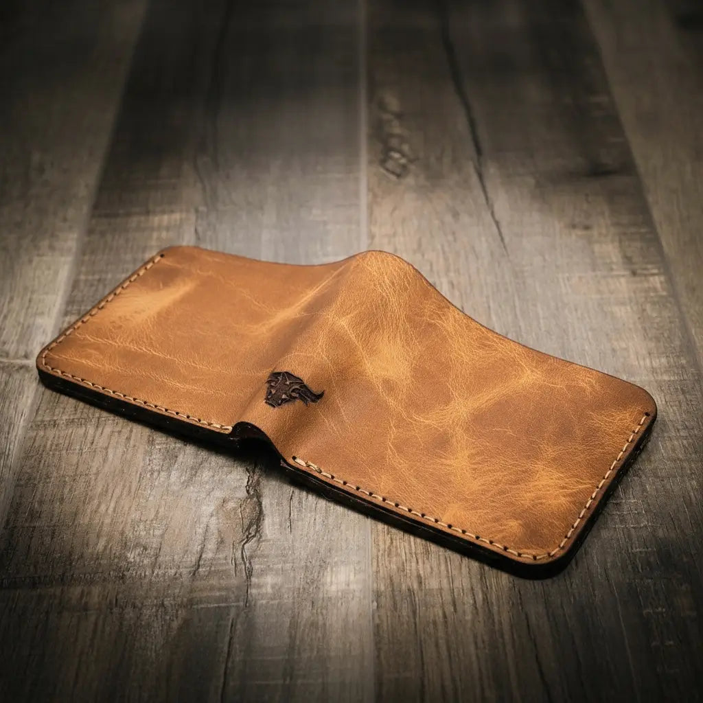 Saddle tan leather bifold wallet open to show eight card slots, view 3