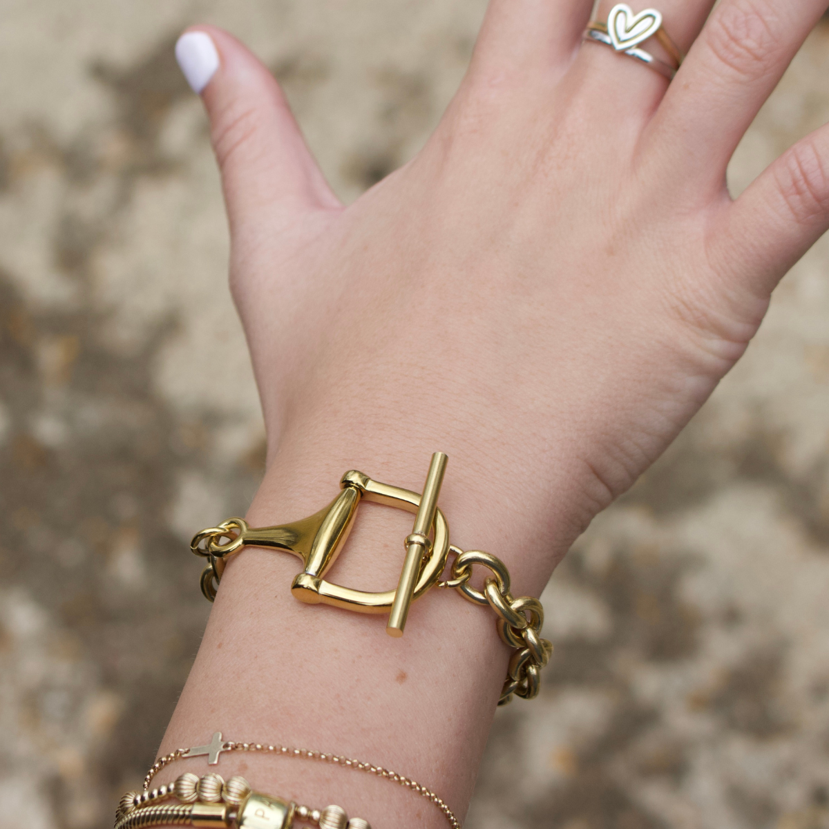 Gold horse bit toggle bracelet