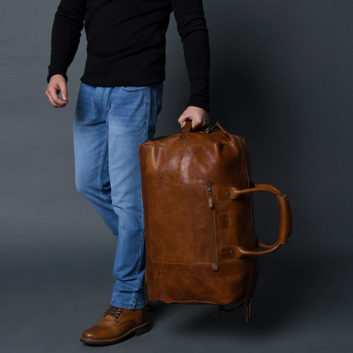 Buffalo leather rolling duffle bag with retractable trolley handle and wheels, view 4