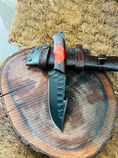 J2 steel skinning knife with wangi wood handle and leather sheath