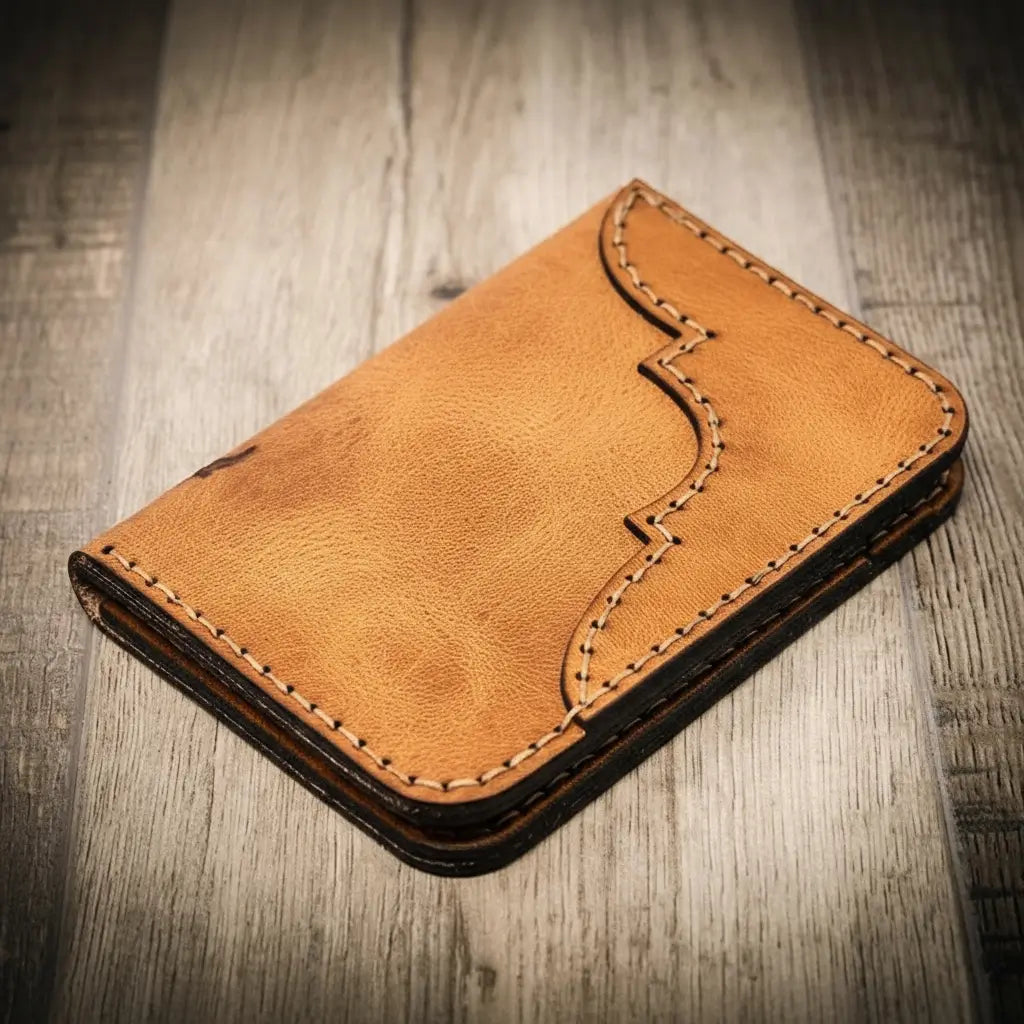 Saddle tan western tooled vertical leather wallet