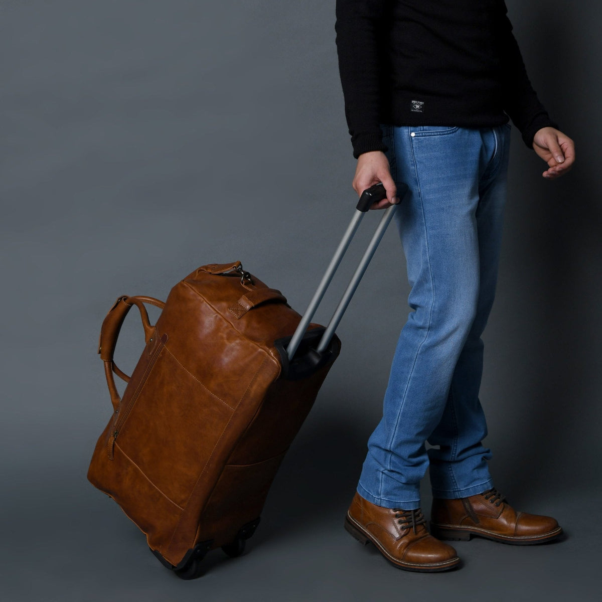 Buffalo leather rolling duffle bag with retractable trolley handle and wheels, view 2