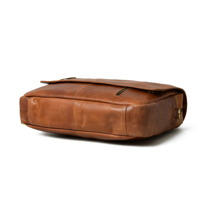 Tan buffalo leather crossbody bag with brass clasp flap, view 4