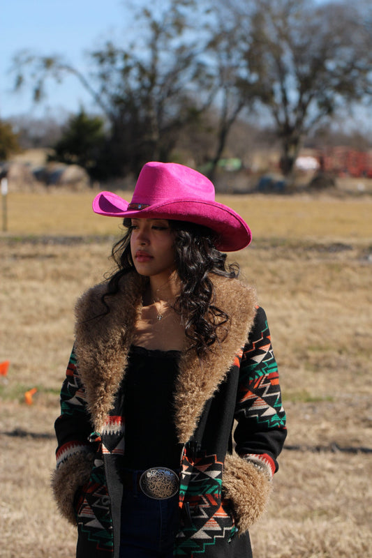 Magenta vegan suede cowboy hat with a lifted brim and faux leather band