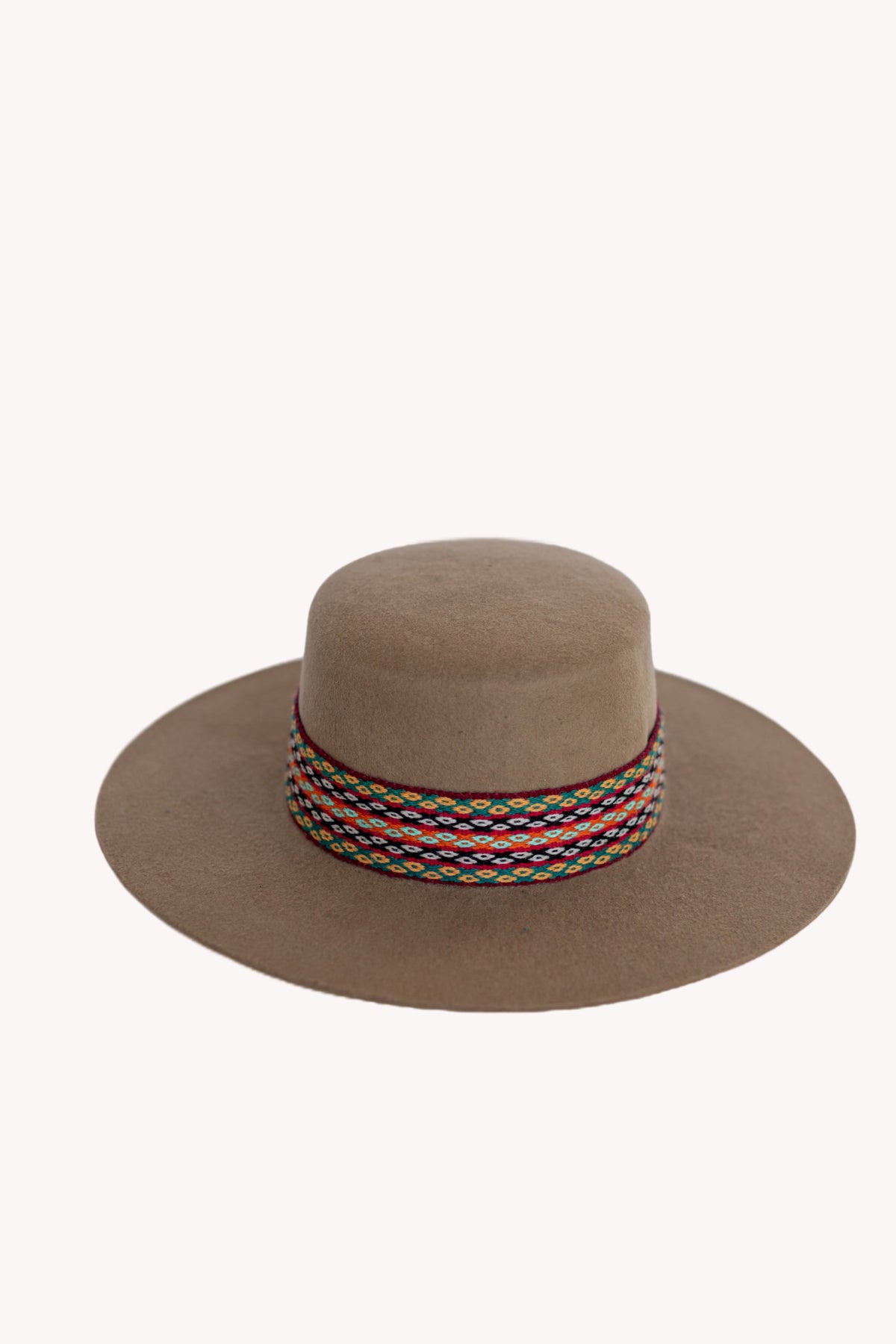 Beige alpaca wool felt Spanish style hat with a woven textile band