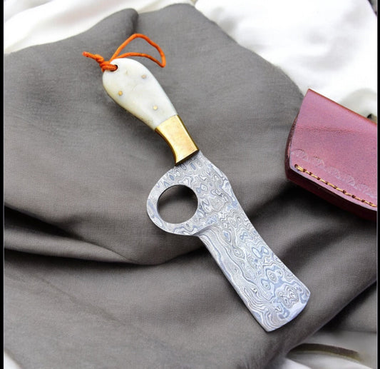 Damascus bull cutter knife with camel bone handle, brass bolster, and leather sheath