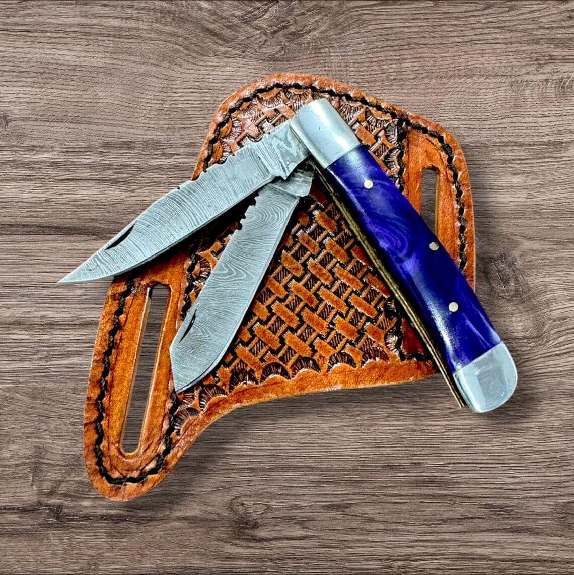 Folding Damascus steel bull cutter knife with resin handle and steel bolster