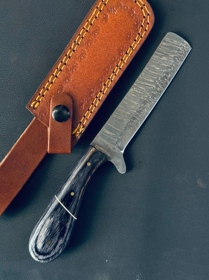The Damascus Pakkawood Calf Cutter | Texan Knives